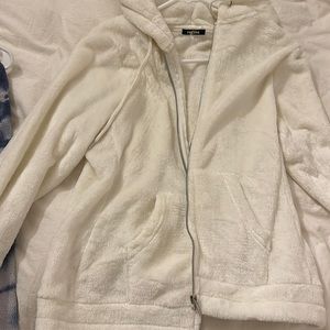 White fluffy zipup